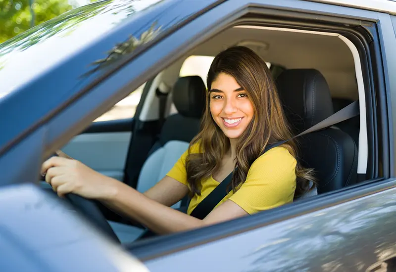 woman in new car